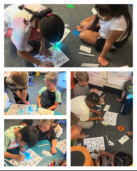 Students working with ozobots